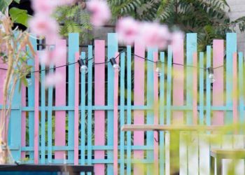 Transforming Your Fence with Artistic Painting Techniques