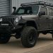4WD vehicle with lift kit upgrade on rugged Melbourne terrain for off-road enthusiasts