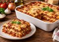 Freshly baked homemade lasagna alla Bolognese with melted cheese and rich tomato sauce